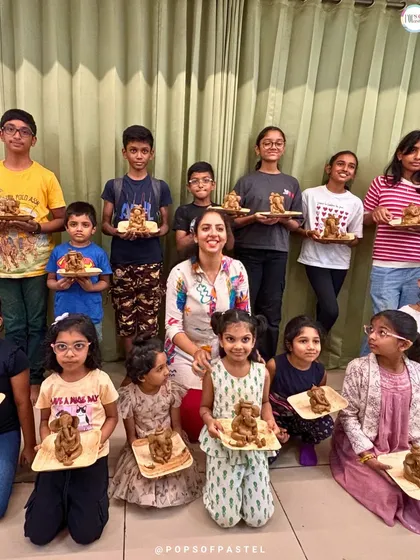 Proud artists with their finished clay Ganeshas! It's always so rewarding to see the beautiful creations made in our studio.