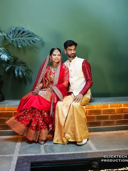 A formal portrait of the couple seated together in their wedding attire. This is the kind of essential family photo I make sure to capture.