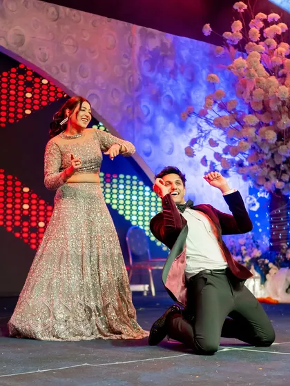 A fun and playful moment from a couple's dance. Our choreography is all about celebrating your unique relationship.