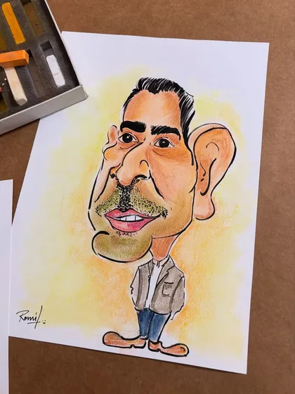 A closer look at one of the solo pastel caricatures. The soft background and expressive lines capture a warm and approachable personality.