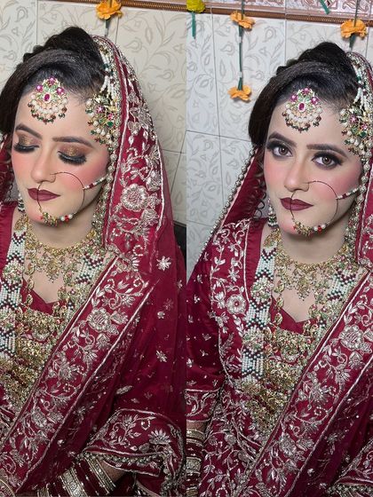 Here you can see the flawless HD makeup base and the contouring that defines her features. The eyes are the focus, with a blend of gold and dark shades, while the deep red lip completes this classic Barat bride look.