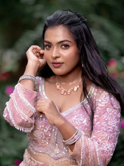 A close-up of a model's reception look, with soft makeup that enhances her natural beauty.