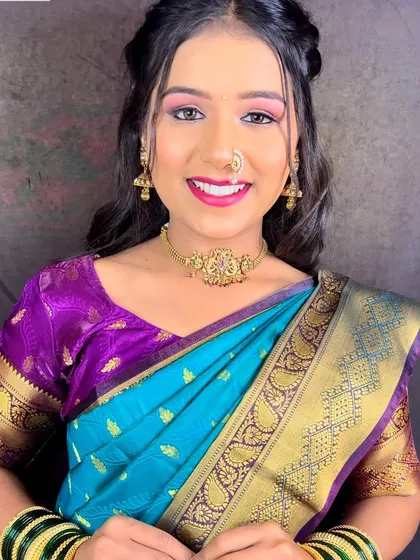 A happy and smiling bride, showing off her engagement makeup. She looks fresh, radiant, and ready for her ceremony.
