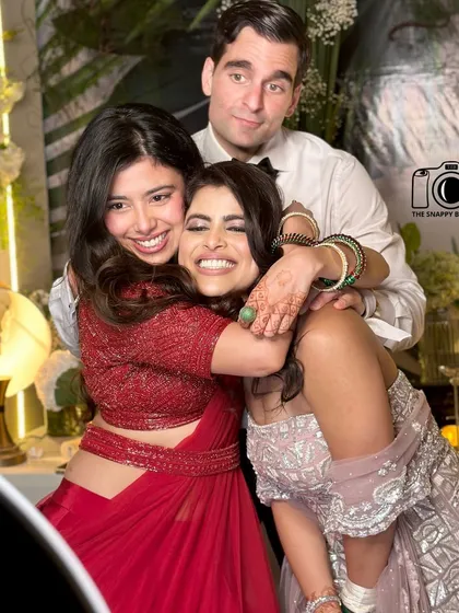 A fun, candid group hug! Our photo booth is the perfect place for friends to get silly and capture the true spirit of their bond.