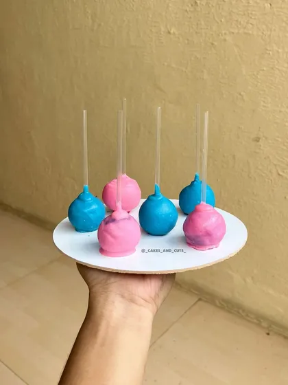 Pink and blue cake pops, another great bite-sized treat for a baby shower dessert table.