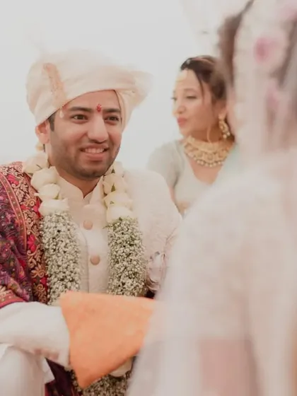 The groom's happy expression as he sees his bride during the ceremony. We capture these priceless, candid moments of love and joy.