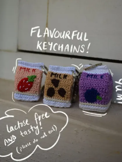 My tasty-looking but definitely not edible milk carton keychains. These amigurumi charms come in different "flavors" like strawberry, blueberry, and chocolate milk, adding a bit of fun to your keys.