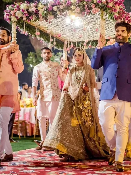 A bride's walk is one of the most cherished moments. This regal entry under a 'phoolon ki chadar' is a perfect example of the classic, elegant, and emotional entrances I love to create.