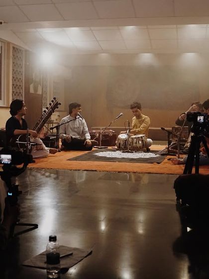 Behind the scenes during the shoot for "Chakra," an album by my band Araj. This image shows the intimate and focused setting where we record our neo-classical instrumental pieces.