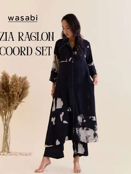 This is the Zia Raglon Co-ord set, featuring one of my signature art-inspired prints. Crafted in pure crepe, this fluid ensemble has delicate hand embroidery on the shoulders and placket. It’s an understated, timeless, and effortlessly refined look that feels like a second skin.