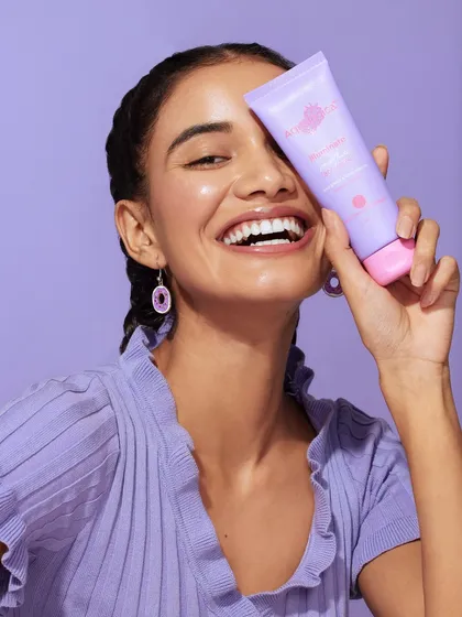 This shot showcases the frilled lavender top and matching earrings I chose to create a sweet and feminine look for the Aqualogica campaign.