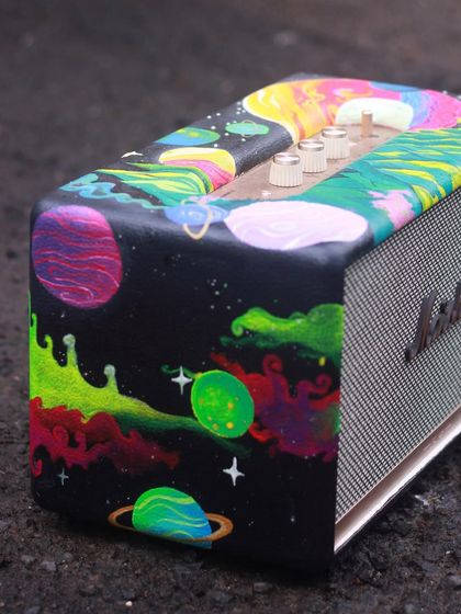 A close-up of the side of the custom Marshall speaker, showing the vibrant, swirling colors of the galaxy.