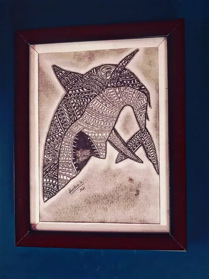 A dynamic drawing of two dolphins, their bodies filled with flowing zentangle patterns.