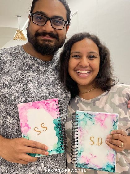 A perfect anniversary gift to each other. This couple created personalized alcohol ink journal covers to commemorate their special day.