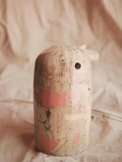 A close-up of the pink and black marbled clay. It’s a slow, meditative process that yields beautifully unique results.