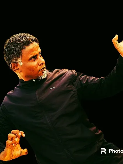 An edited photo capturing the intensity and hand positions of a combat stance.
