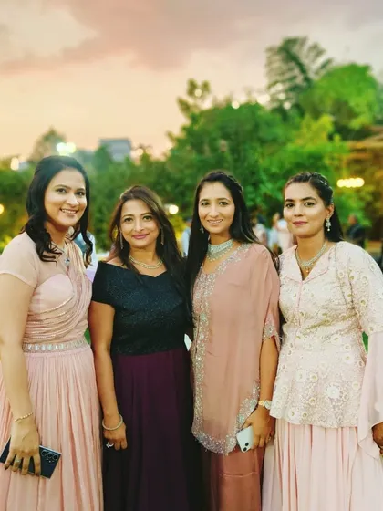 With guests at a baby naming ceremony in Pune. These intimate family gatherings are about creating a relaxed and happy environment where everyone can share in the joy of the occasion.
