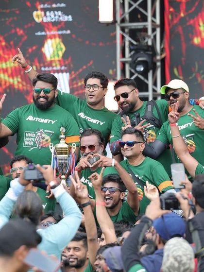 Champions on stage! The pure joy and brotherhood after being recognized at WMD. This picture captures the heart and soul of our celebration.