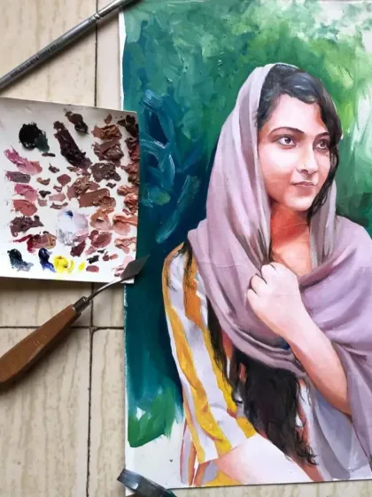 An A3 size oil painting of a woman in a dupatta, with a lush green background. The color palette is next to it, showing the skin tones I mixed.