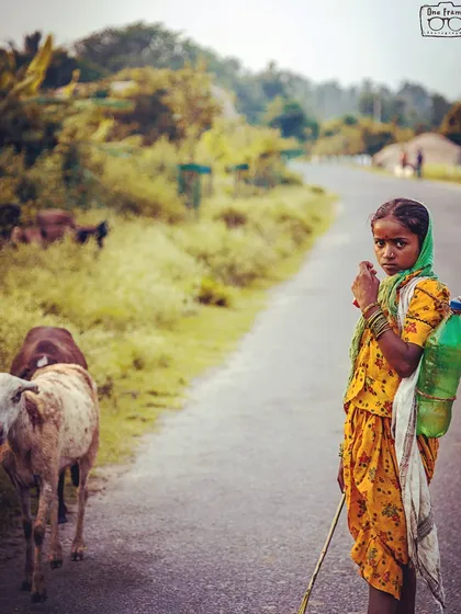 I took this portrait of a young shepherd girl on a road in Hampi. Her direct gaze is so powerful. For me, an artistic individual portrait is about capturing the soul of the person and their connection to the world around them, using natural light to tell their story.