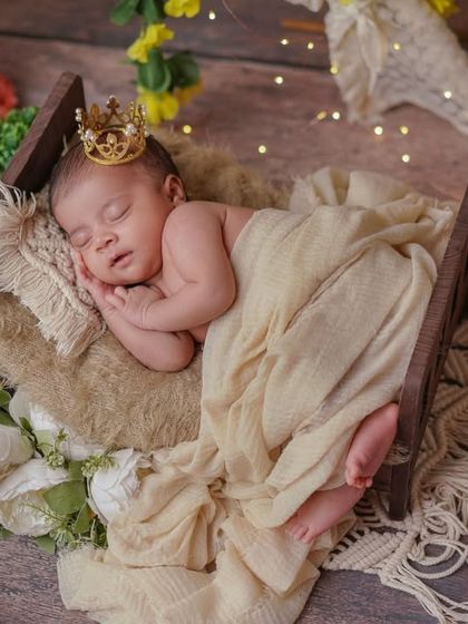 The gift of love. This rustic, floral setup is perfect for creating a warm and enchanting portrait of your sleeping baby.