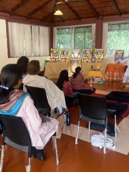 A teacher leads a discussion during our Janmashtami satsang. We explore the meaning of Krishna's life and teachings in a relaxed, interactive setting.