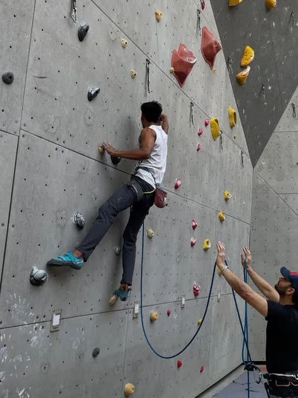 Trust between a climber and their belayer is essential in lead climbing. Our community is built on this foundation of support and shared passion.