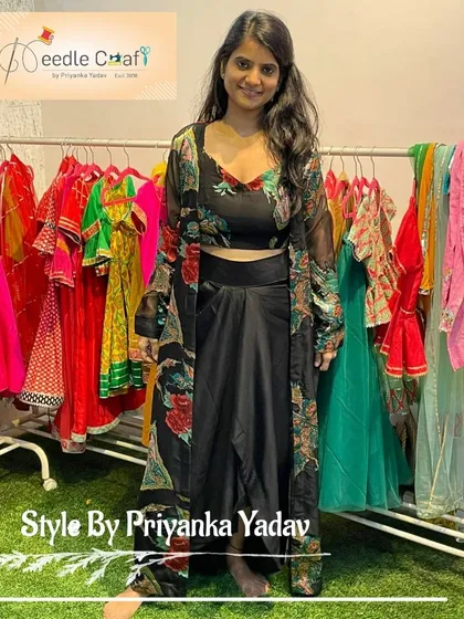 This modern Indo-Western outfit, featuring a drape skirt and a sheer jacket, was created by upcycling an old saree. It’s a perfect example of how we can blend contemporary style with traditional fabrics.