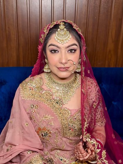 Jasleen, a vision of elegance for her pheras. This airbrush bridal makeup look is soft, subtle, and perfectly enhances her features.