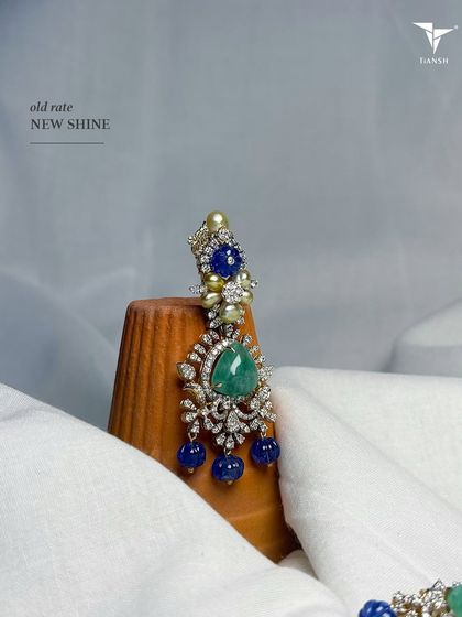 This earring, with its combination of emerald, sapphire, and diamonds, is the one piece you should carry to all your wedding destinations. It is versatile, elegant, and now available at a special rate.