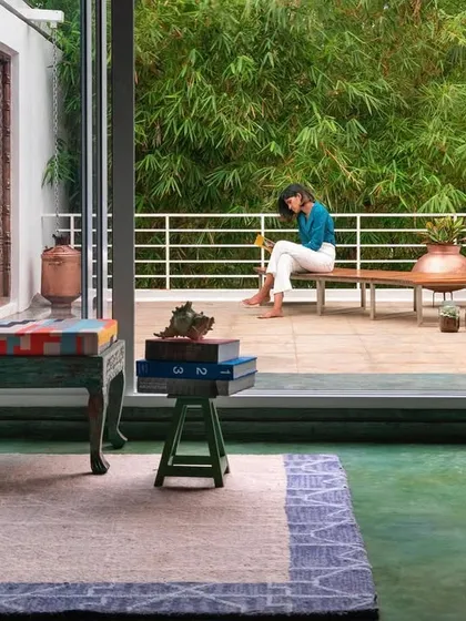 The roof garden and event space at our studio, designed as a tranquil escape within the urban environment. This area demonstrates our belief in creating social spaces that connect with nature, featuring a blend of comfortable seating, lush greenery, and a seamless transition to the outdoors.
