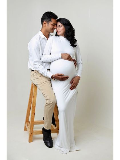 Another take on the stool pose, this time with a slightly different angle that captures the loving gaze between the couple.