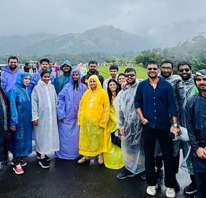 The group posing at the Banasura Sagar Dam in Wayanad. We cover all the key sightseeing spots on our weekend itineraries.