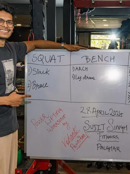 Breaking down the science of the "Big Three" lifts at a powerlifting workshop. My coaching is built on a technical foundation, ensuring every athlete understands the 'why' behind their training, from stacking and bracing in the squat to leg drive in the bench.