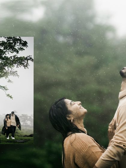 A beautiful moment of a couple looking up at the sky, enjoying the feeling of rain on their faces together.