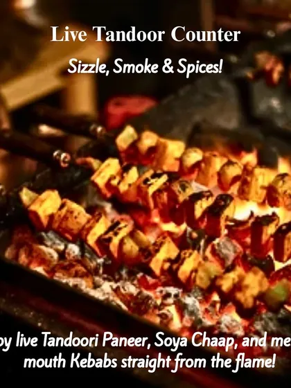 Nothing beats the aroma of a live tandoor. Watch as we grill melt-in-your-mouth Paneer Tikka, Soya Chaap, and succulent kebabs, adding a smoky and spicy highlight to your celebration.