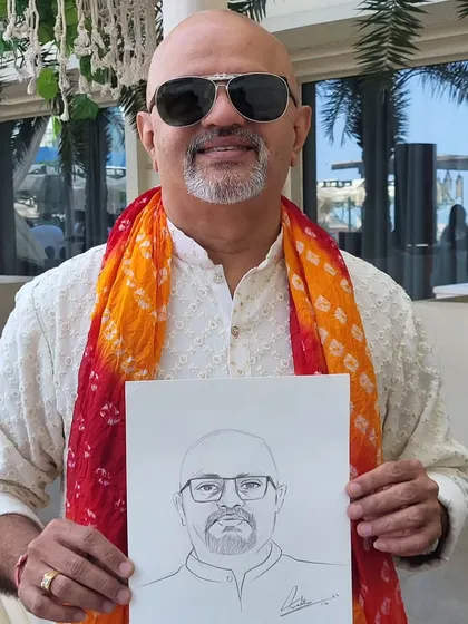 Each portrait is a quick, expressive sketch done with graphite. I focus on capturing a likeness and a bit of personality in just a few minutes, so more of your guests get a chance to have their portrait done. This gentleman was a great sport at a wedding in Janakpuri.