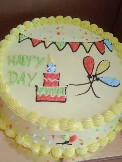 A simple and cheerful hand-drawn cake design to wish someone a "Happy Day."