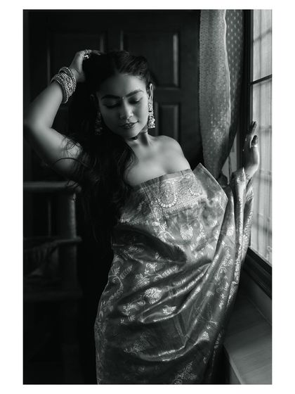 A black and white version of a beautiful ethnic portrait. The monochrome conversion adds a timeless and artistic quality to the image.