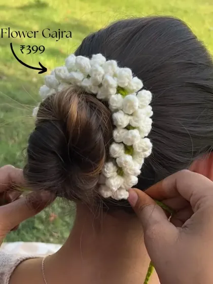 Our beautiful white floral gajra, inspired by fragrant mogra, is the perfect finishing touch for an elegant traditional look. It's handmade and priced at just ₹399.