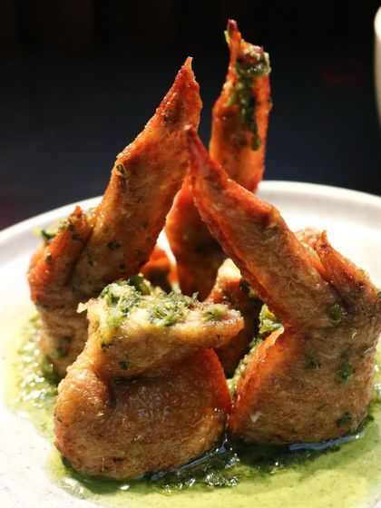 Crispy boneless chicken wings with an Asian chimichurri, a popular dish from the Grumps, Goa event that showcased their fun, unpretentious style.