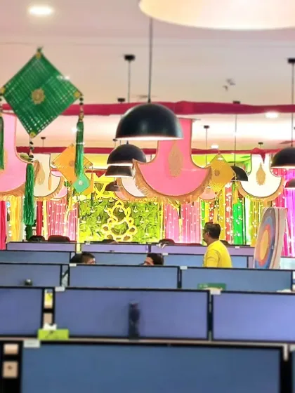 Another view of the decorated office cubicles. The colorful hangings and streamers created a joyful atmosphere for the employees during the festive season.