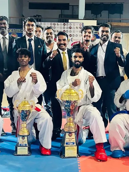 The result of relentless dedication. Our team of champions after sweeping the Grand Open Kumite Championship. We consistently produce fighters who bring home the gold.