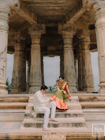 Set against the grandeur of a heritage temple, this pose captures a sense of timeless elegance. I love blending the richness of classic architecture with the personal story of a couple's love.