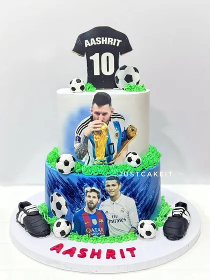 A huge football-themed cake for a fan of Messi and Ronaldo. The cake features edible images and hand-molded footballs and shoes.