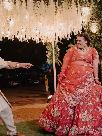 The bride and groom dancing their way into their mehndi ceremony. We love choreographing fun, interactive entries that get the party started right away.