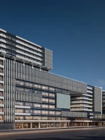 An evening render of the Vasai mixed-use development, highlighting the architectural form. A sky bridge connects the two main blocks, enhancing circulation and visual dynamism within the complex.