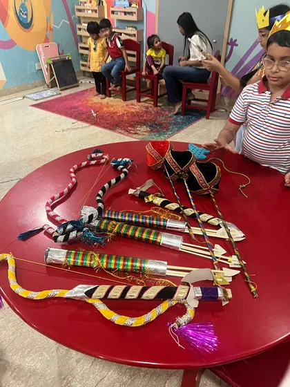 Our Ramleela preparations are in full swing. The children get to see and handle the handmade props like bows, arrows, and crowns before the big performance.