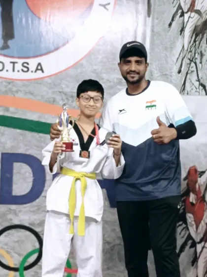 This young champion earned his trophy and medal through sheer hard work. I am proud to be his coach.