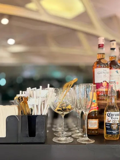 A snapshot from the #sanjtookthedive wedding celebration. Our bar was fully stocked with premium spirits like Glenfiddich and Corona, ready to craft perfect drinks for the happy couple and their guests.